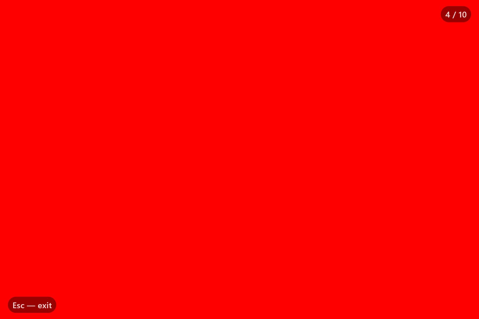 The fullscreen red test screen with a subtle counter in the corner