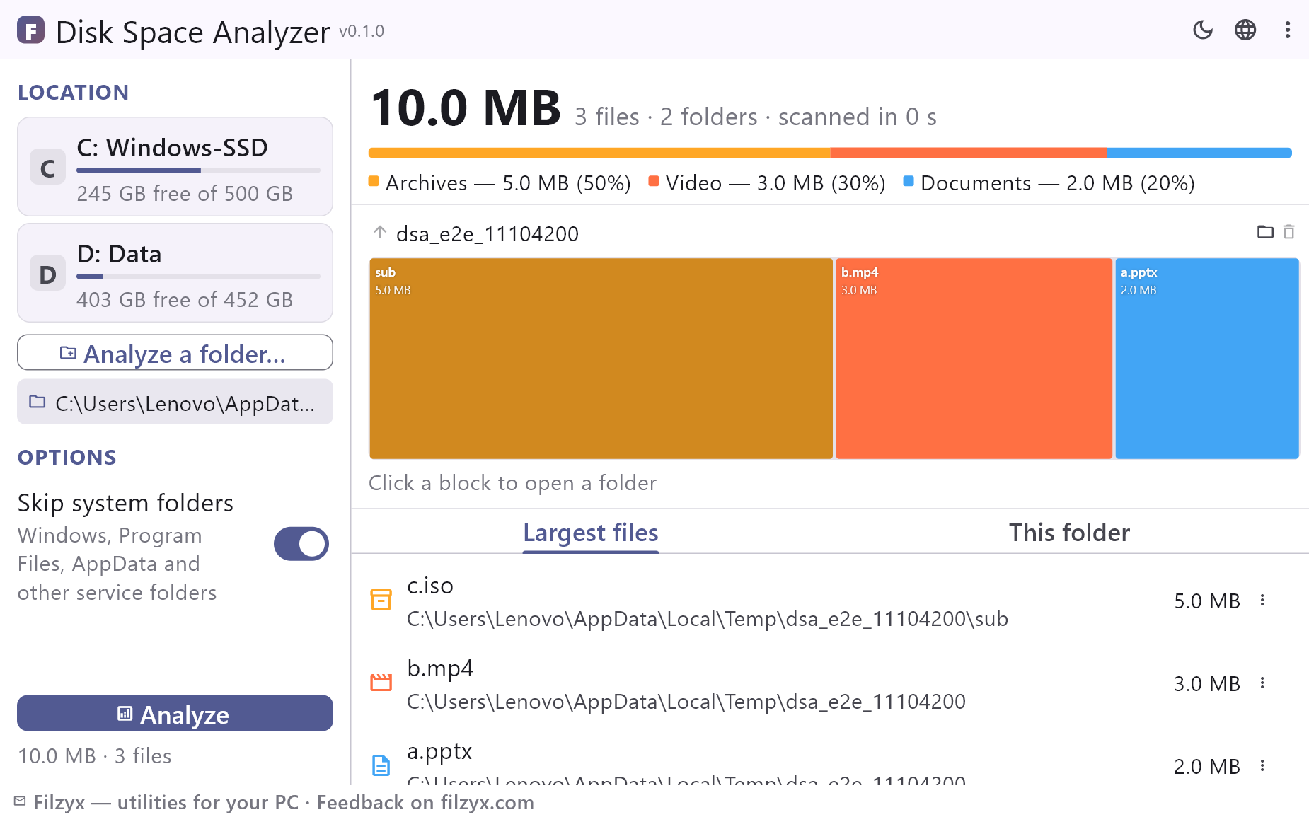 Disk Space Analyzer after a scan: category bar, treemap of folders and files, and the largest files list in the light theme